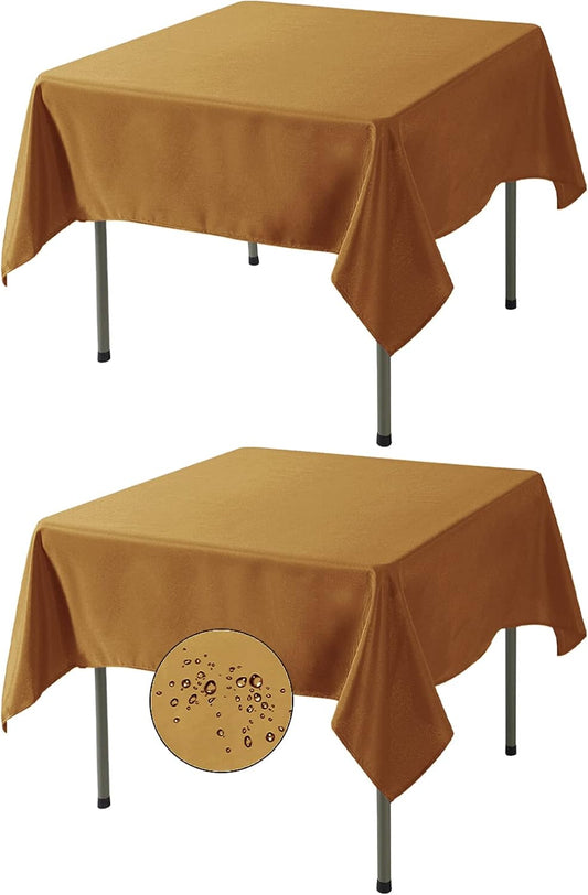Fokitut 2 Pack Waterproof Square Tablecloth, 70x70 Inch, Stain Resistant and Wrinkle Polyester Table Cloth, Fabric Table Cover for Kitchen Dining, Wedding, Party, Holiday Dinner-Gold