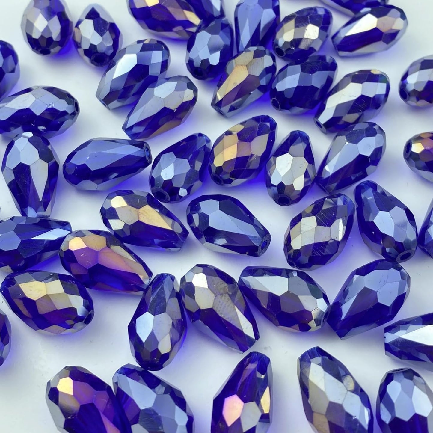 130pcs 6x8mm Teardrop Crystal Glass Beads Vertical Hole Faceted Glass Teardrop Spacer Beads for Bracelets Necklace Earring DIY Jewelry Making Craft(Sapphire Blue AB)