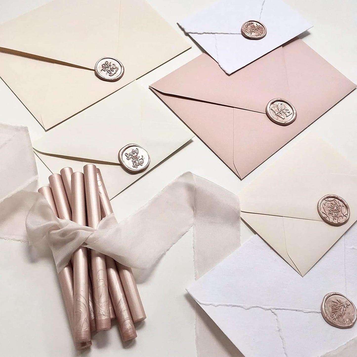UNIQOOO Metallic Champagne Rose Glue Gun Sealing Wax Sticks for Wax Stamp, Wedding Invitation, Card Envelope, Snail Mail, Wine Package, Gift, Pack of 8
